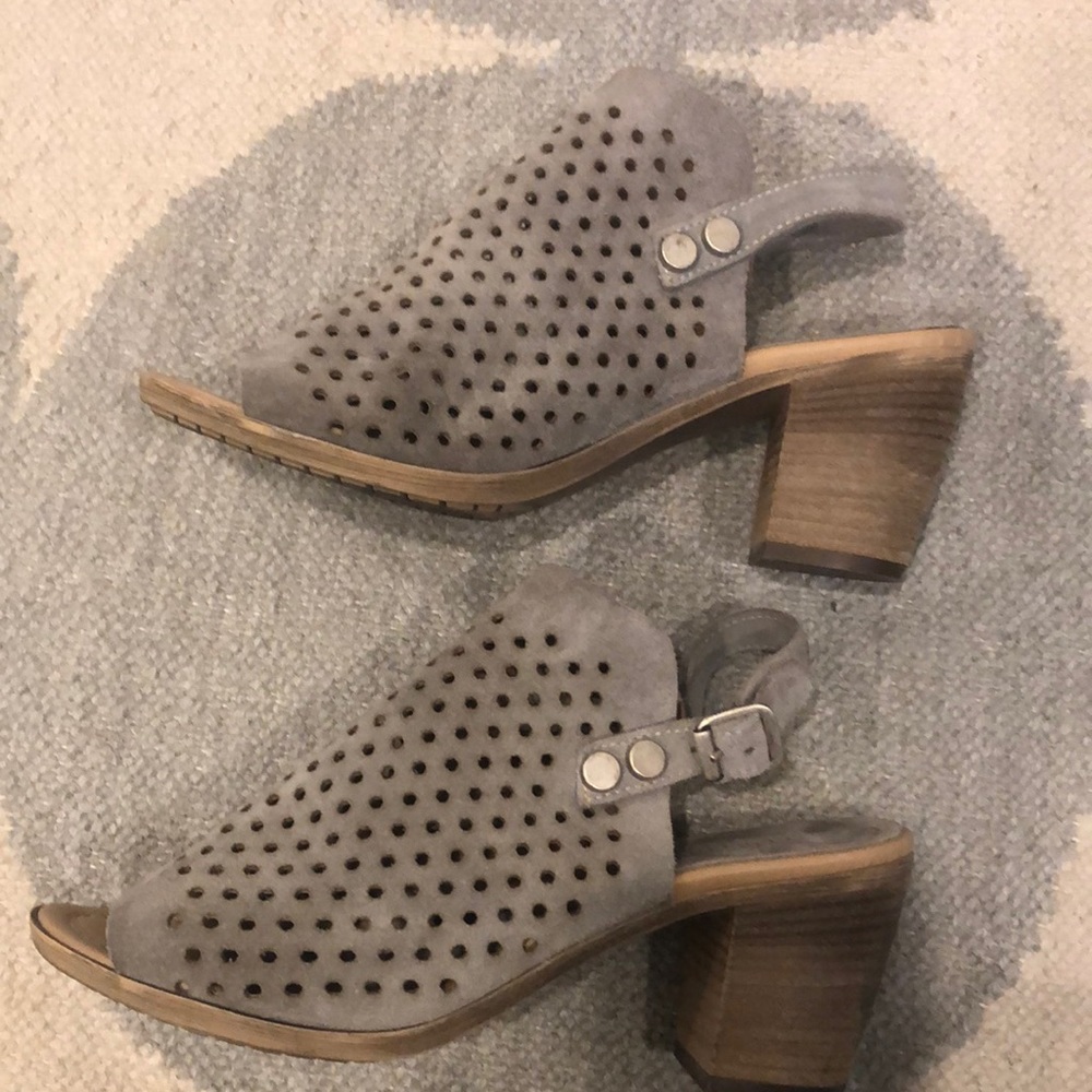 Taupe perforated suede shoes.